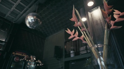 Piano playing in a cafe at night Front Cover