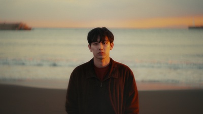 オレンジのジャケット写真